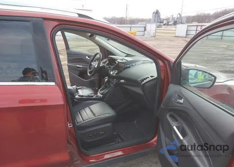 2015 Ford Escape Titanium z USA, uszkodzony, nr VIN 1FMCU0JX9FUC86604